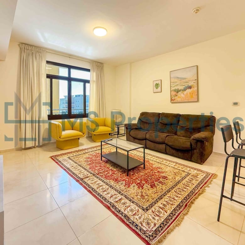 Elegant 1BR Apartment with Balcony | Prime Location