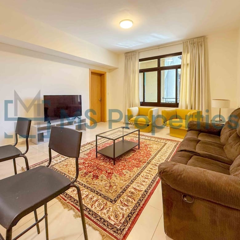 Elegant 1BR Apartment with Balcony | Prime Location