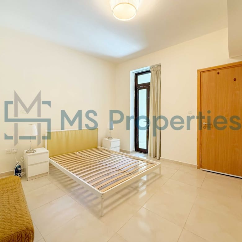 Elegant 1BR Apartment with Balcony | Prime Location