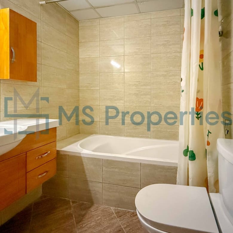 Elegant 1BR Apartment with Balcony | Prime Location