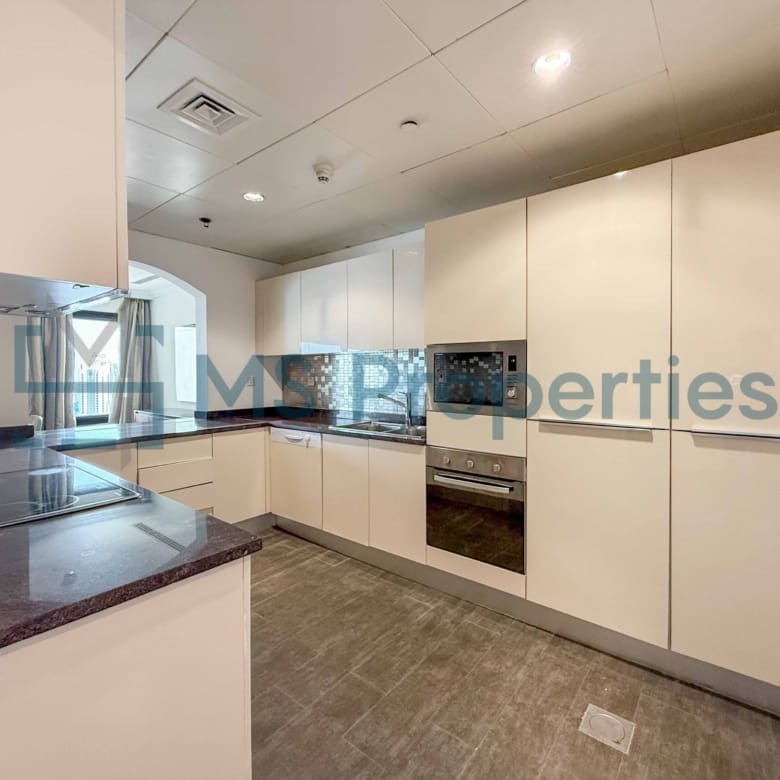 Premium Furnished 2BHK with Balcony | Qcool Included
